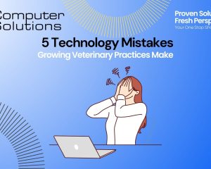 veterinary clinic expansion technology article title image, showing a frustrated woman with her hands over her face sitting in front of a laptop